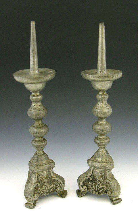 Pair of Pewter Pricket Candlesticks, 19th c., on : Pair of Pewter Pricket Candlesticks, 19th c., on knopped shafts to relief decorated tripodal bases, H.- 15 1/2 in., Dia.- 4 m1/4 in.