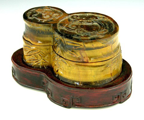 Carved Tiger Eye Desk Box, 19th c., of joined dou: Carved Tiger Eye Desk Box, 19th c., of joined double cylinder form, the lid with relief carved salamanders, the sides with relief bamboo carving, now fastened to a custom carved mahogany stand, H.- 3 
