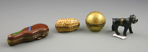 Group of Four Limoges Hand Painted Dresser Boxes,: Group of Four Limoges Hand Painted Dresser Boxes, 20th c., in the form of a peanut, a Schnauzer dog, a guitar case, and a gilt globe.