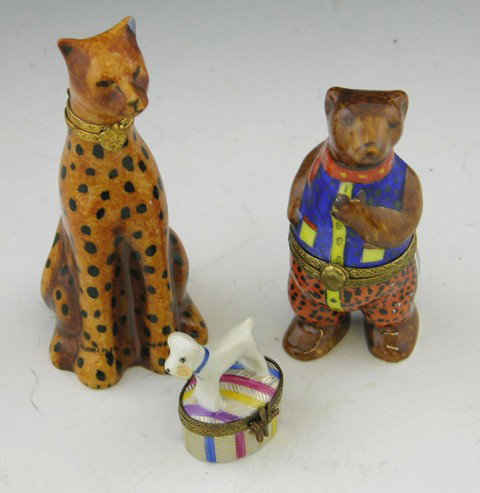 Group of Three Limoges Hand Painted Dresser Boxes: Group of Three Limoges Hand Painted Dresser Boxes, 20th c., in the form of a well dressed bear, a jaguar, and a dog on a box.