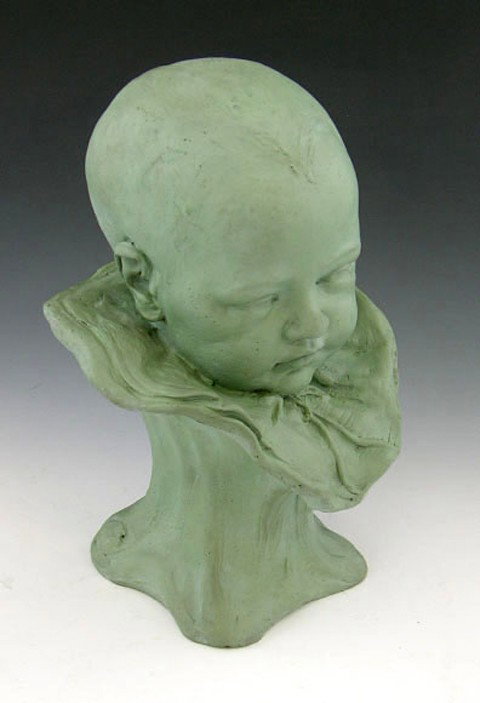 Painted Plaster Bust of a Child, c. 1904, the rea: Painted Plaster Bust of a Child, c. 1904, the rear of the integral plinth marked "F. S. C., may 12, 1904," now in green paint, H.- 4 in., W.- 7 in., D.- 6 3/4 in.