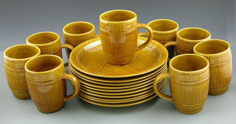 French Nineteen Piece Partial Dinner Service, 20th: French Nineteen Piece Partial Dinner Service, 20th c., by Gien, consisting of 10 plates and 9 handled mugs, all in dark yellow glaze.