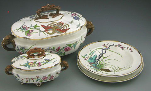 Four Pieces of Minton's China, 19th c., consisting: Four Pieces of Minton's China, 19th c., consisting of a covered tureen, a covered sauce tureen, a soup bowl, and a dinner plate, each marked #9345, with floral and stork decoration.
