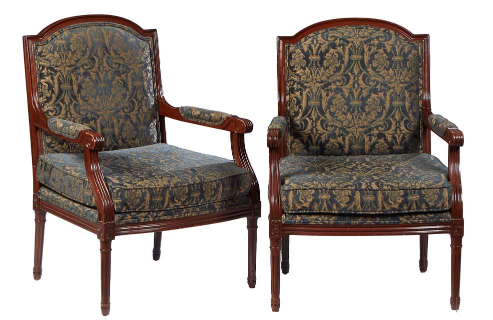 Pair of Louis XVI Style Carved Beech Fauteuils, 20th c., the arched canted upholstered back over: Pair of Louis XVI Style Carved Beech Fauteuils, 20th c., the arched canted upholstered back over upholstered arms and an upholstered bowed seat, on turned tapered reeded cylindrical legs, in blue and 