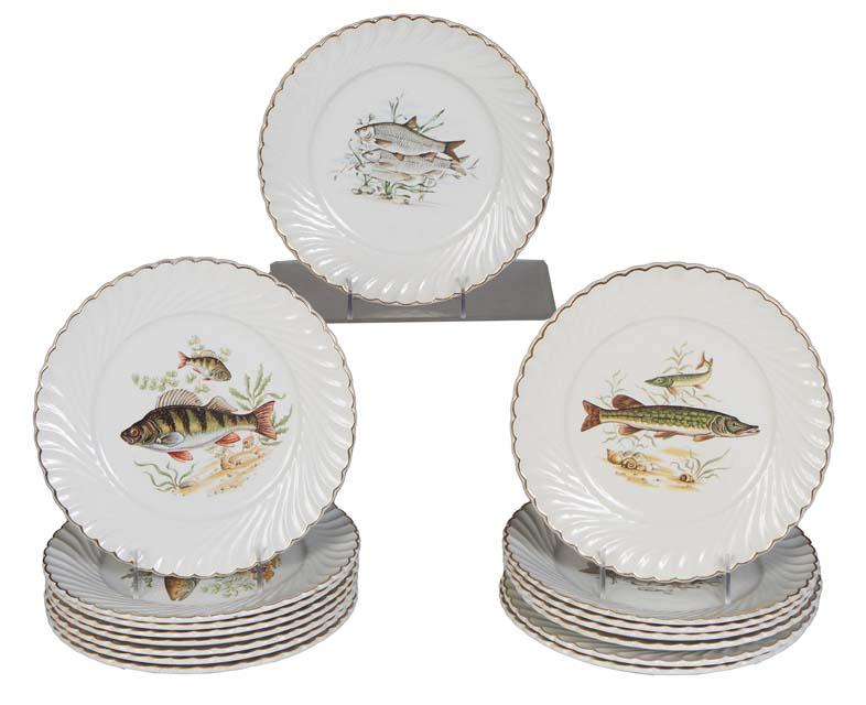 Sixteen Piece French Porcelain Fish Set, 20th c., by Luneville, the sixteen plates with gilt: Sixteen Piece French Porcelain Fish Set, 20th c., by Luneville, the sixteen plates with gilt scalloped rims above a swirled band around transfer fish decoration, H.- 1 in., Dia.- 9 5/8 in. (16 Pcs.)