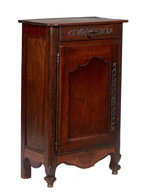 French Provincial Louis XV Style Carved Oak Confiturier, 19th c., the rounded corner top over a: French Provincial Louis XV Style Carved Oak Confiturier, 19th c., the rounded corner top over a frieze drawer with a long iron escutcheon, above a cupboard door with a long iron escutcheon and fiche h