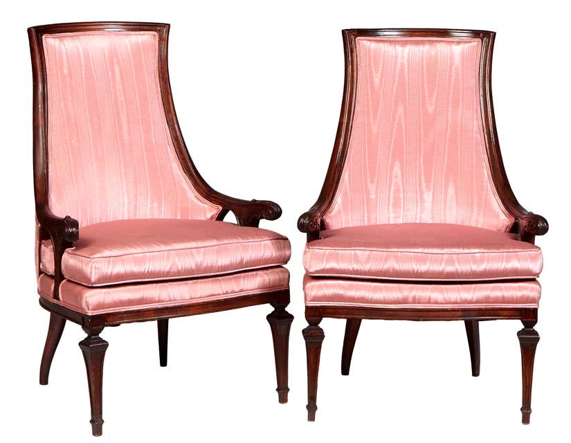 Pair of Louis XVI Style Carved Beech Bergeres, 20th c., the high canted curved upholstered back to: Pair of Louis XVI Style Carved Beech Bergeres, 20th c., the high canted curved upholstered back to leaf carved scrolled arms, flanking a removable bowed cushion seat, on tapered square legs, in pink s