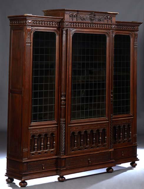 French Henri II Style Carved Walnut Bookcase, c. 1880, the stepped spindled crown over a central (1 of 16)