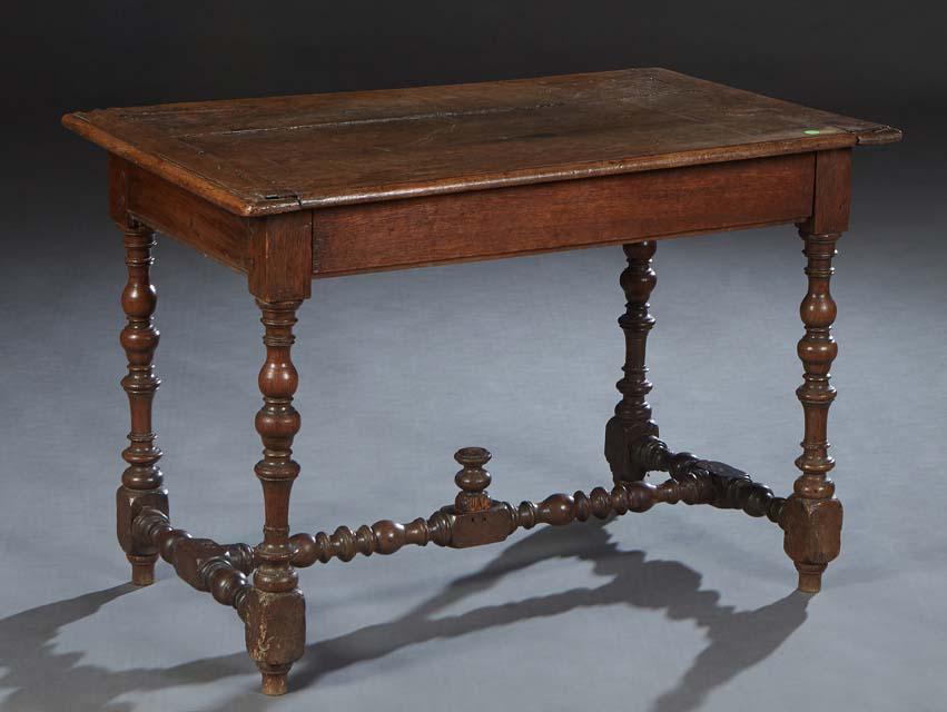 French Provincial Louis XIII Style Carved Oak Writing Table, 20th c., the rounded edge top over a (1 of 2)