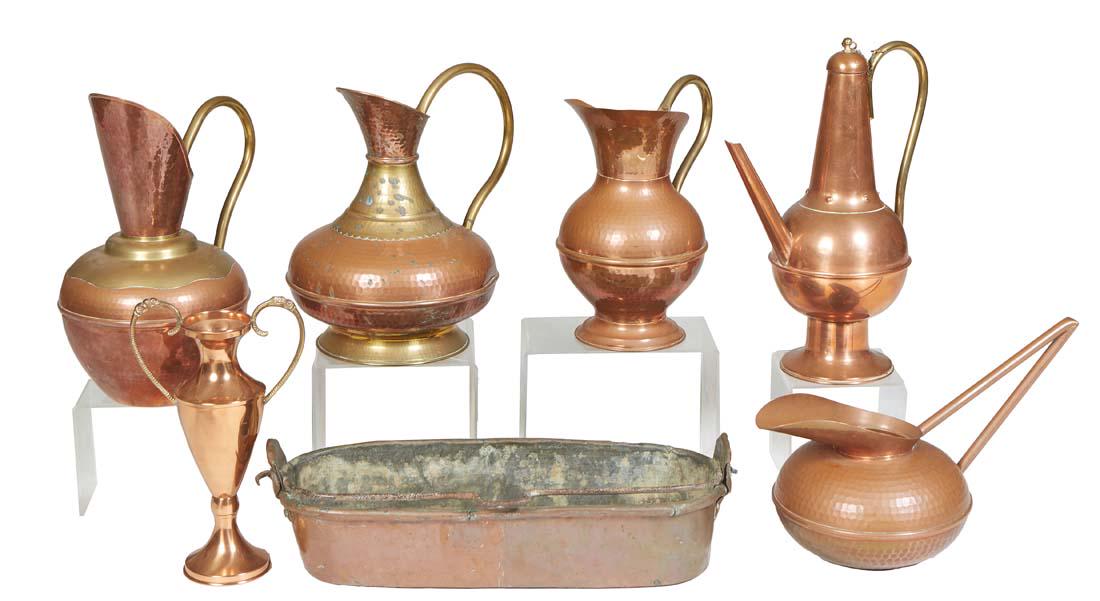 Group of Seven Copper Kitchen Items, 20th c., consisting of three brass handled pitchers; a loving (1 of 1)
