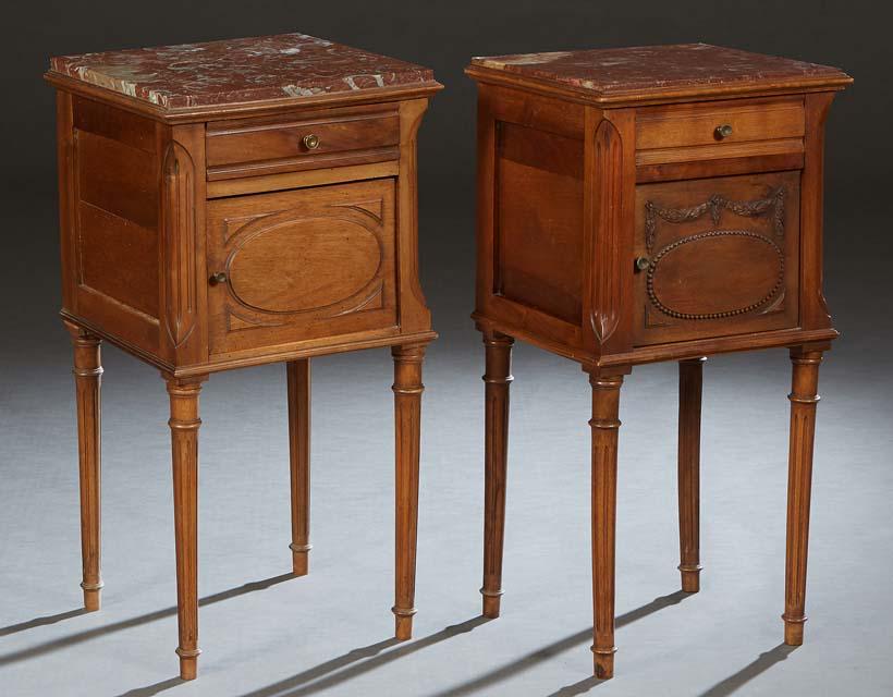 Near Pair of French Louis XVI Style Carved Walnut Marble Top Nightstands, 20th c., the inset highly (1 of 1)