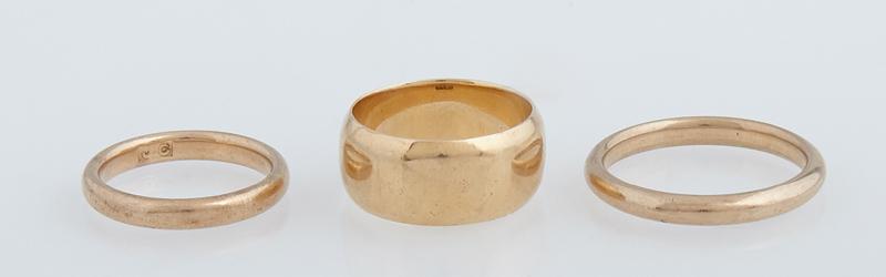 Group of Three 18K Yellow Gold Wedding Bands, early 20th c., one sized 7 3/4, two sized 4 1/2, Wt.- (1 of 1)