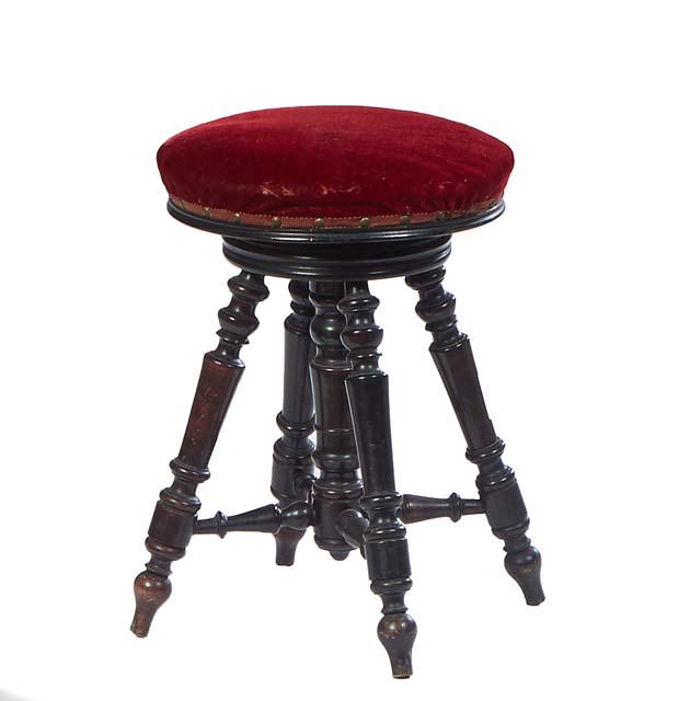 French Ebonized Adjustable Piano Stool, late 19th c., the circular magenta velvet upholstered (1 of 1)