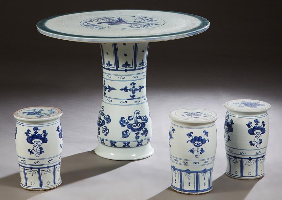 Chinese Porcelain Four Piece Patio Set, 20th c., consisting of a circular table with bird and floral (1 of 1)
