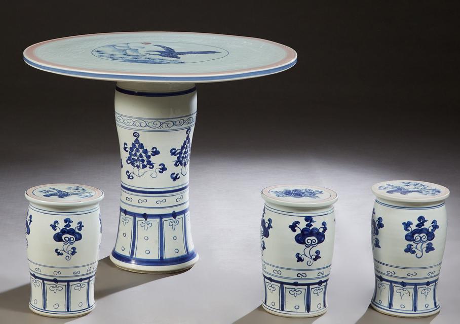 Chinese Porcelain Four Piece Patio Set, 20th c., consisting of a circular table with bird and floral (1 of 1)