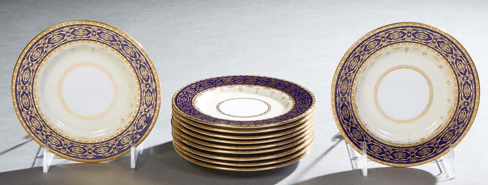 Set of Eleven Minton Porcelain Saucers, early 20th c., made for Tiffany & Co., with gilt rims around: Set of Eleven Minton Porcelain Saucers, early 20th c., made for Tiffany & Co., with gilt rims around gilt decorated cobalt banding, H.- 5/8 in., Dia.- 6 in. (11 Pcs.) Provenance: Property from a Gentl