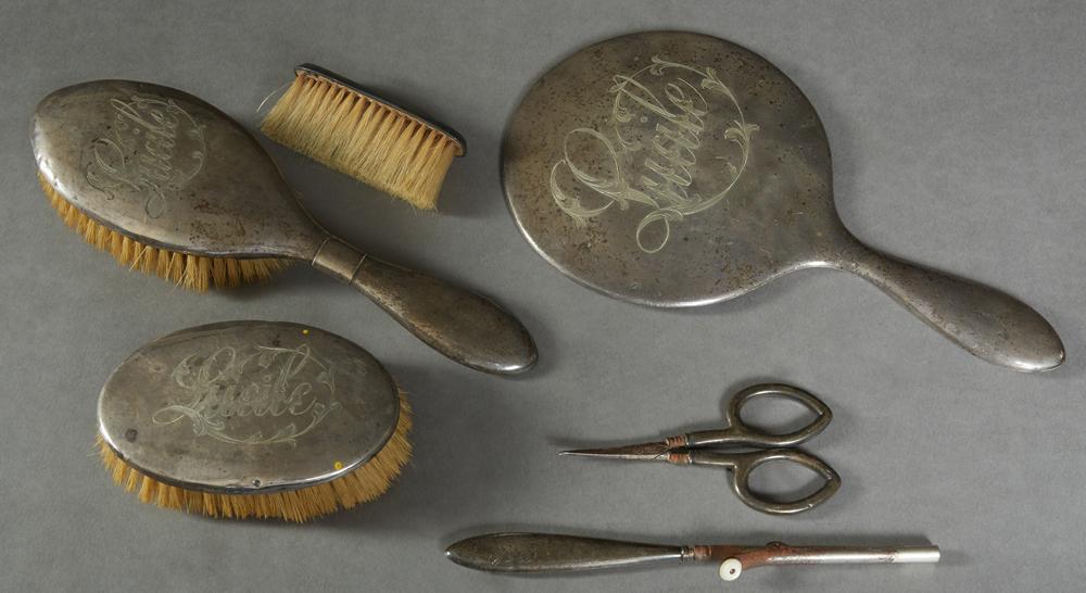Six Piece Assembled Lady's Sterling Dresser Set, early 20th c., consisting of a hand mirror, clothes (1 of 1)