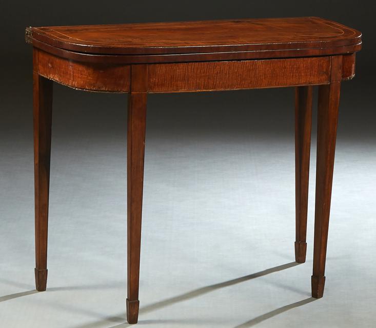 English Inlaid Mahogany Demilune Games Table, early 20th c., the swiveling top opening to a baize (1 of 2)