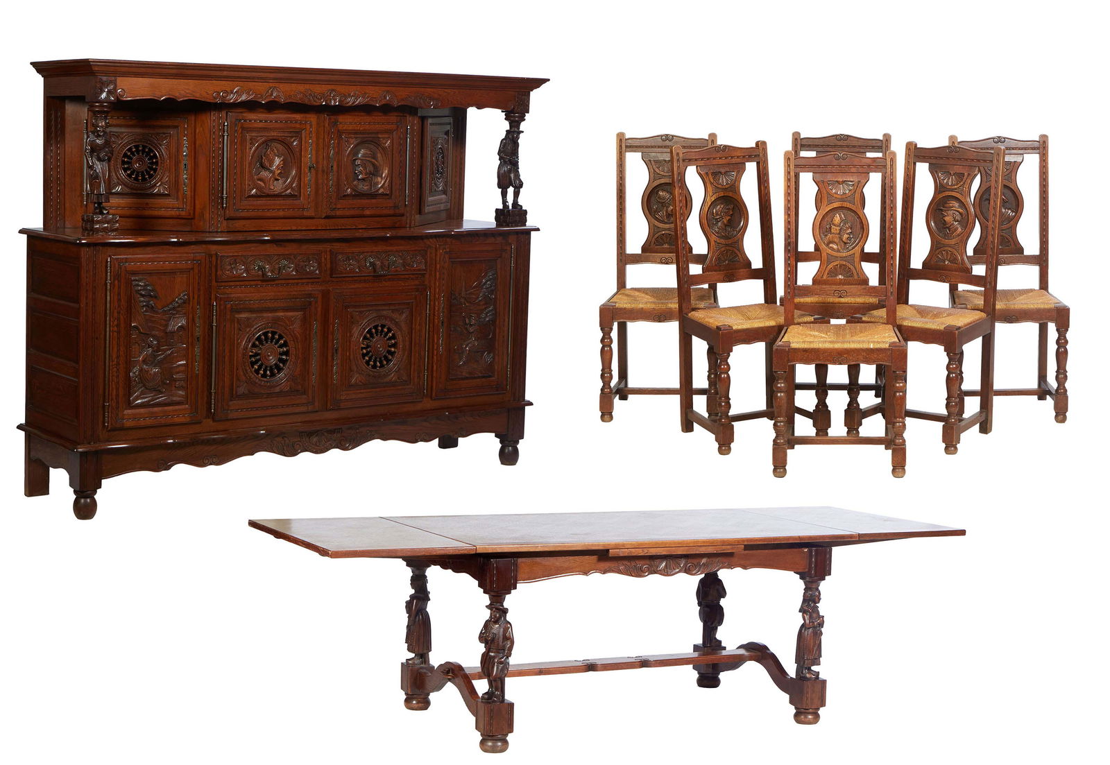 French Provincial Eight Piece Figural Carved Oak Dining Room Suite, 20th c., Brittany, consisting of (1 of 5)