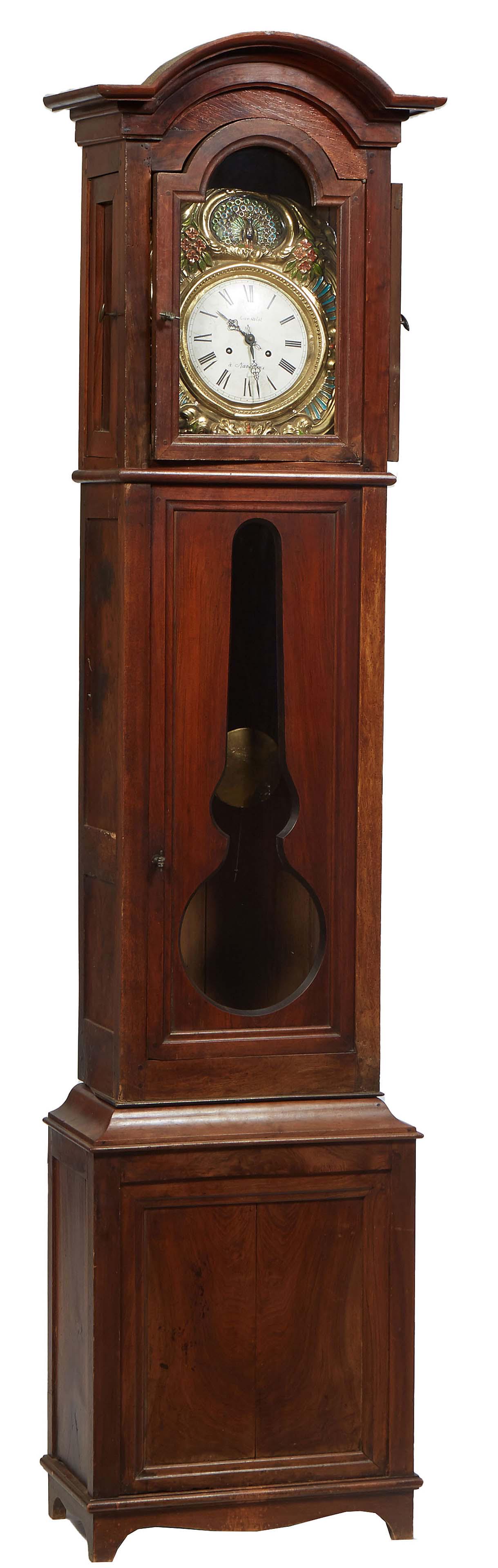 French Provincial Carved Walnut Tallcase Clock, 19th c., the stepped arched crown over a polychromed (1 of 1)