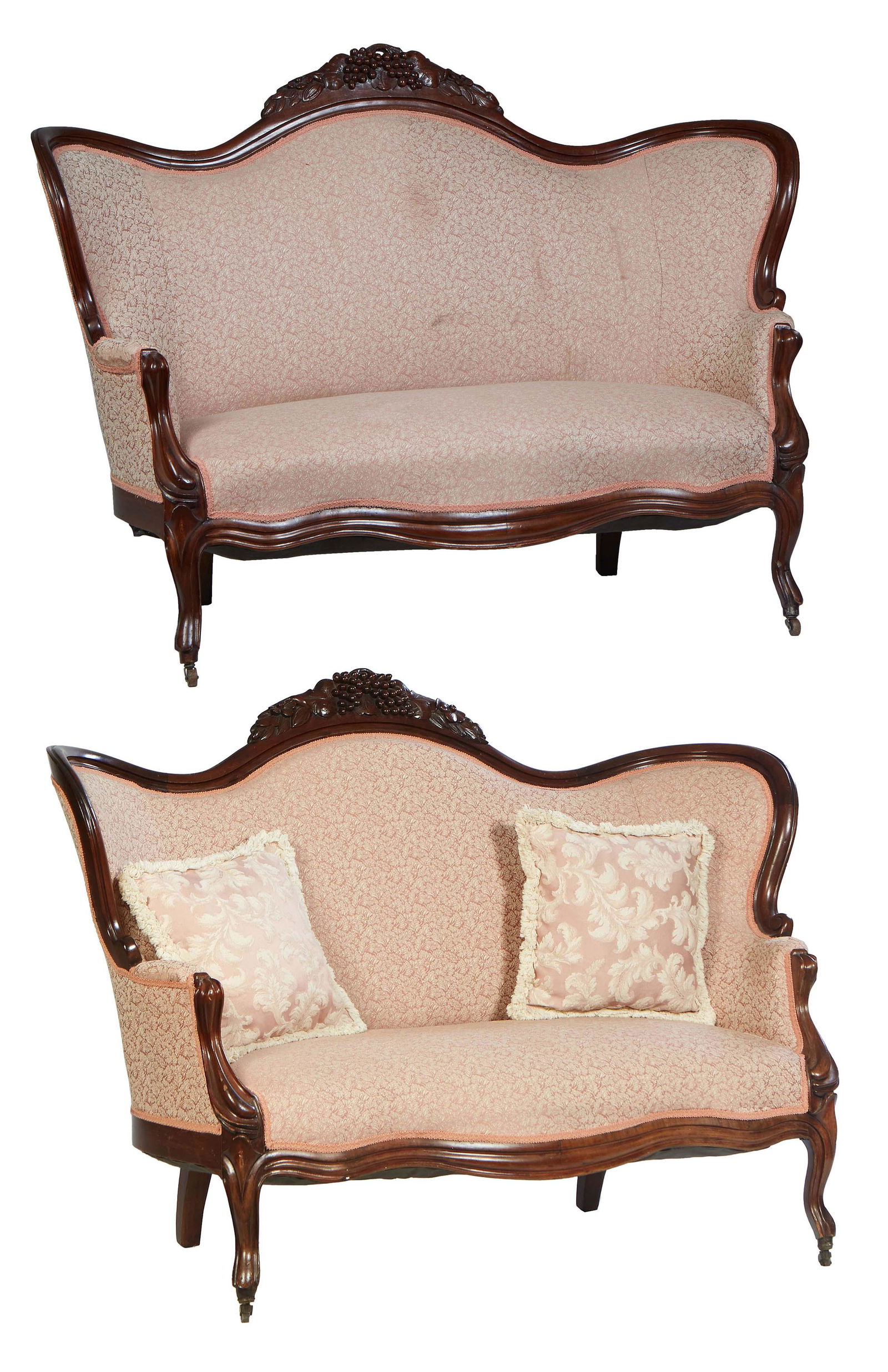 Pair of American Victorian Carved Walnut Settees, late 19th c., the arched back with grape and: Pair of American Victorian Carved Walnut Settees, late 19th c., the arched back with grape and floral relief carving, above a cushioned back to rounded cushioned arms, on a serpentine bowed seat, on c