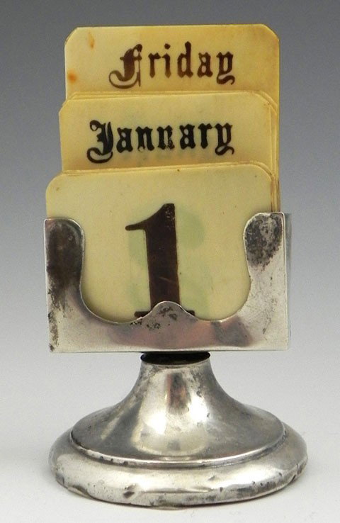 Unusual Diminutive Sterling Desk Calendar, London,: Unusual Diminutive Sterling Desk Calendar, London, 1929, with celluloid printed cards for month, day and date, complete, H.- 2 3/4 in., Dia.- 1 1/2 in.