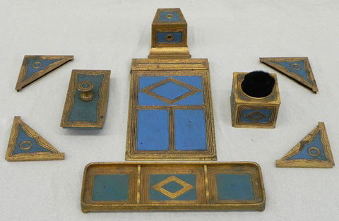 Nine Piece Tiffany Bronze and Enamel Desk Set, in : Nine Piece Tiffany Bronze and Enamel Desk Set, in the "Graduate" pattern, consisting of four blotter corners, #1600; note pad, #1808; pen wipe, # 1794, inkwell, #1601, rocker blotter, # 1602; and tray