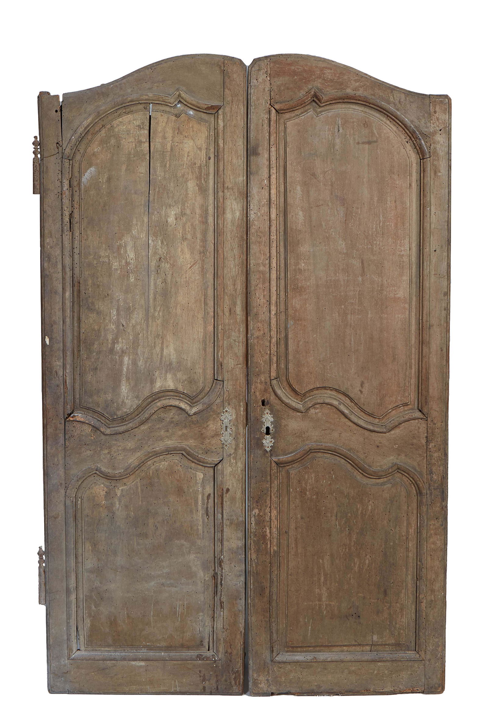 Pair of French Provincial Carved Walnut Armoire Doors, 19th c., with double arched fielded panels, (1 of 1)