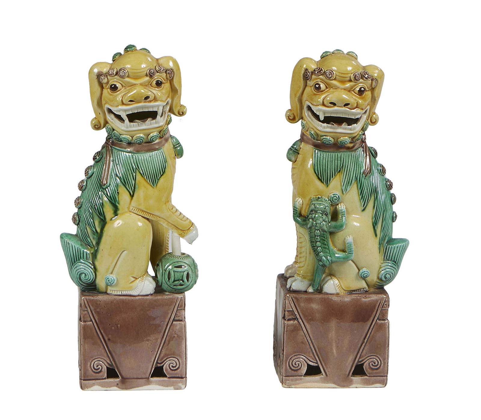 Pair of Chinese Polychromed Earthenware Foo Dogs, 20th c., on an integral rectangular base, H.- 11 (1 of 1)