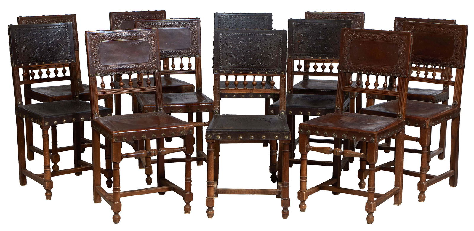 Set of Twelve French Henri II Style Carved Oak Dining Chairs, c. 1880, the canted embossed brown (1 of 1)
