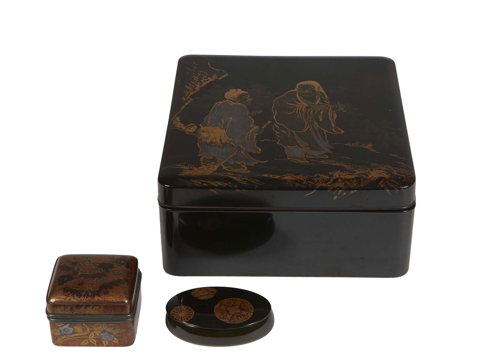 Group of Three Japanese Desk Items, 20th c., consisting of a Suzuri-Bako black lacquer writing box (1 of 3)