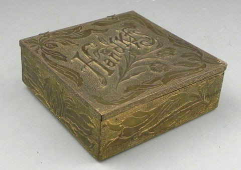 Newcomb College Hammered and Pierced Brass Handker: Newcomb College Hammered and Pierced Brass Handkerchief Box, early 20th c., the cover with relief decoration and wording, H.- 21 1/4 in., W.- 6 in., D.- 6 in.