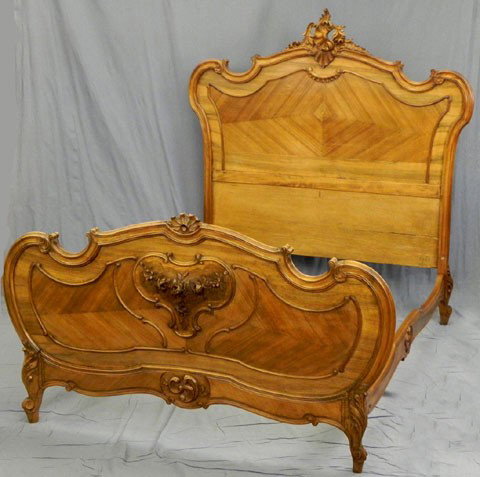 French Carved Walnut Louis XV Style Bed, c. 1900, : French Carved Walnut Louis XV Style Bed, c. 1900, the arched headboard with a leaf and C-scroll crest over a parquetry inlaid back, to a serpentine top footboard, with shaped parquetry inlaid rails wi