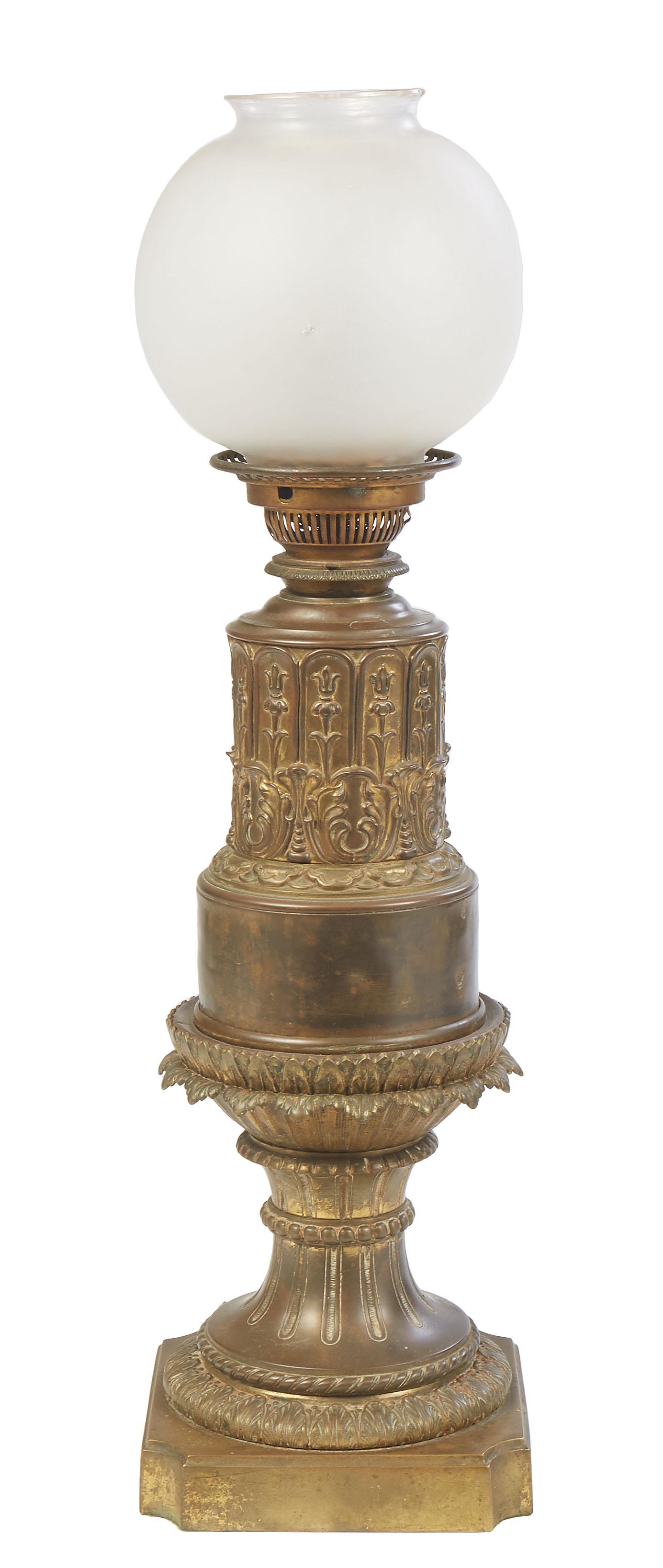 American Brass Oil Lamp, late 19th c., the large floral relief font on a large socle support, to a (1 of 2)