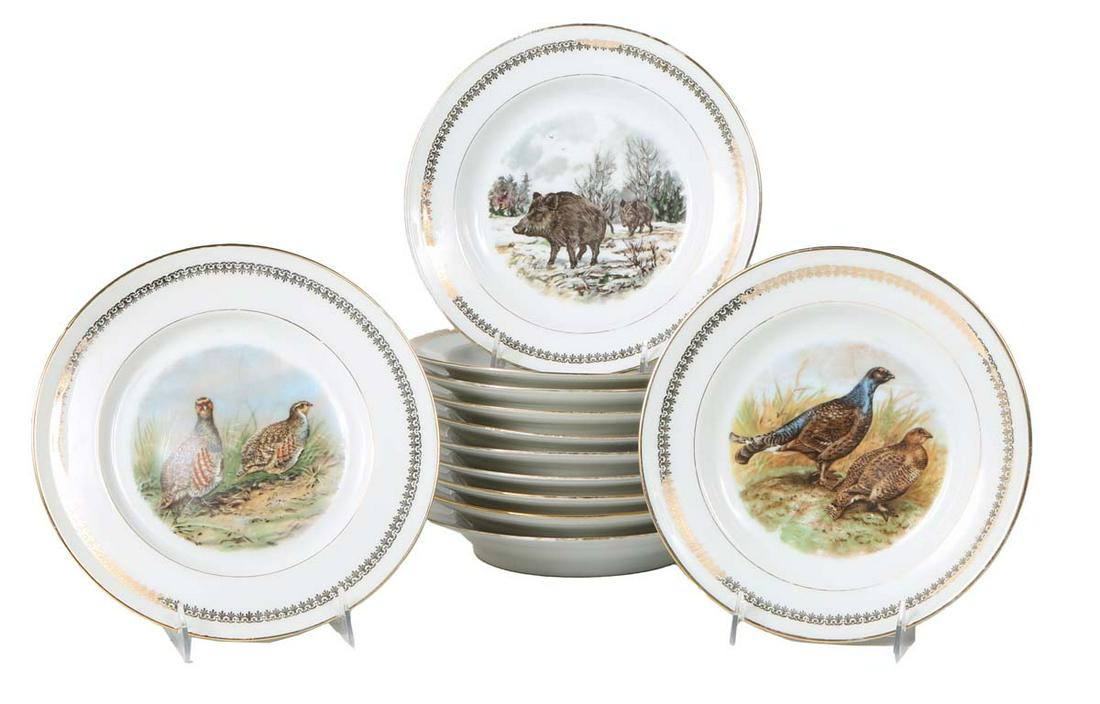 Set of Twelve French Limoges Porcelain Game Bird Plates & Bowls, 20th c., with gilt rims and (1 of 2)