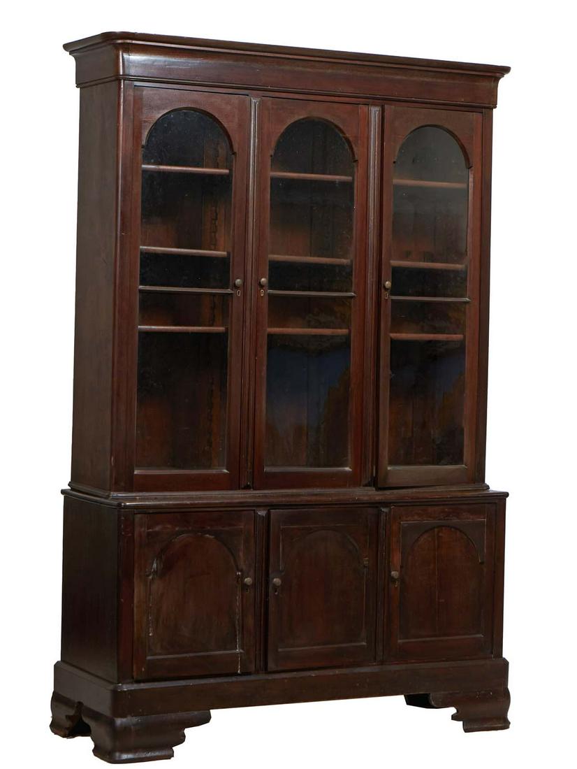 Louisiana Carved Rosewood Triple Door Bookcase, late 19th c., the stepped rounded corner crown over (1 of 1)