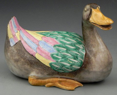 Chinese Export Porcelain Figure of a Duck, decorate: Chinese Export Porcelain Figure of a Duck, decorated in Famille rose enamels with a brown body, presented on a wooden platform seat, H.- 5 5/8 in., W.- 7 7/8 in., D.- 5 1/2 in.