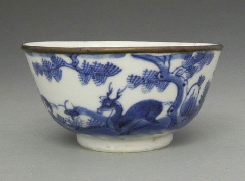 Chinese Porcelain Tea Cup, early 19th c., the side: Chinese Porcelain Tea Cup, early 19th c., the sides decorated with deer in a landscape, with a copper rim, signed on the bottom, H.- 1 7/8 in., Dia.- 3 5/8 in.