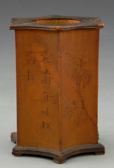 Oriental Carved Wood Hexagonal Brush Pot, late 19t: Oriental Carved Wood Hexagonal Brush Pot, late 19th c., the convex side panels with bamboo and floral decoration, alternating with calligraphic incised panels, the whole on six integral block feet, H.