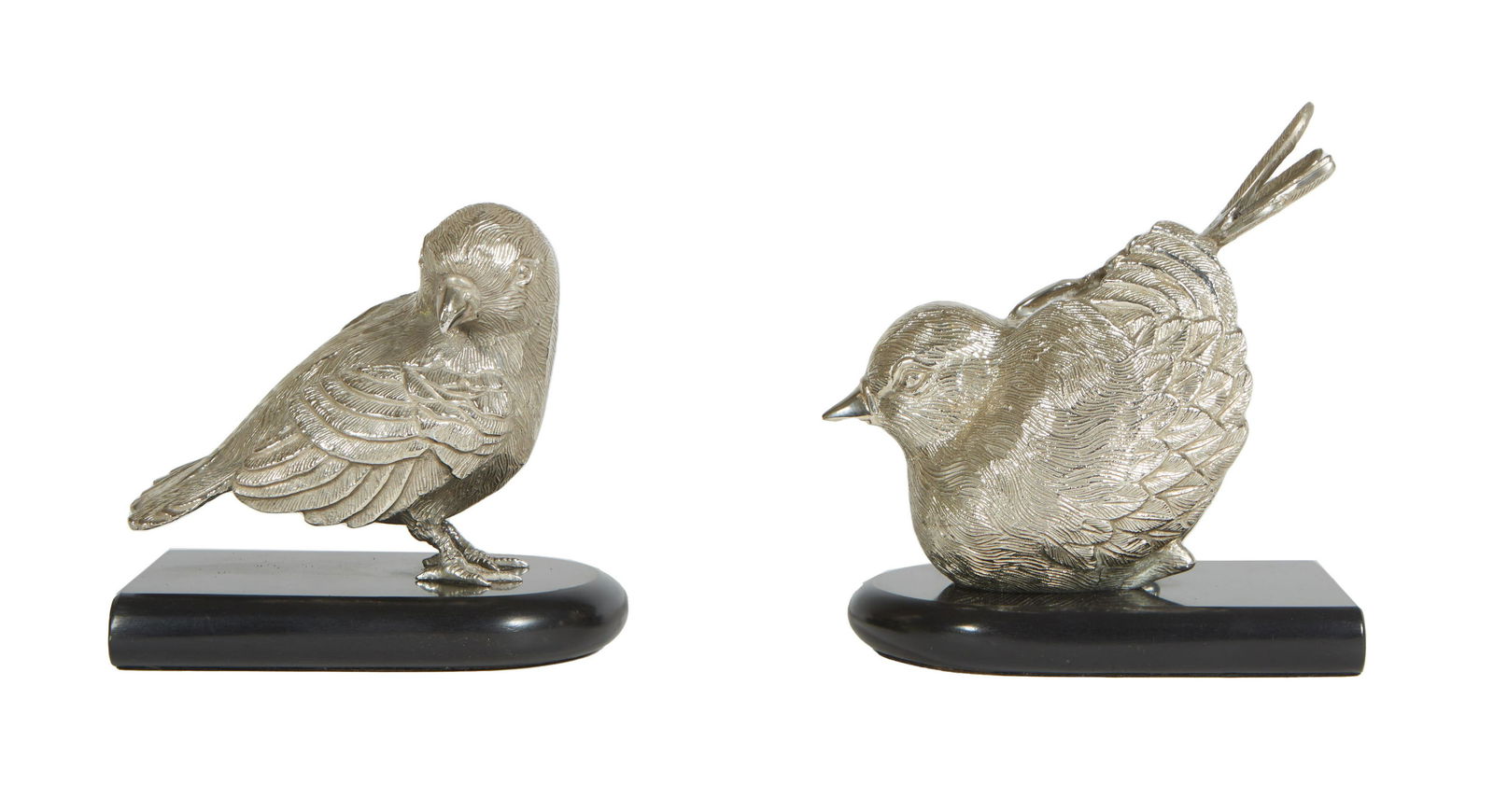 Pair of Indian Silvered Resin Bookends, 20th c., on faux black marble bases, H.- 6 in., W.- 7 in., D (1 of 2)