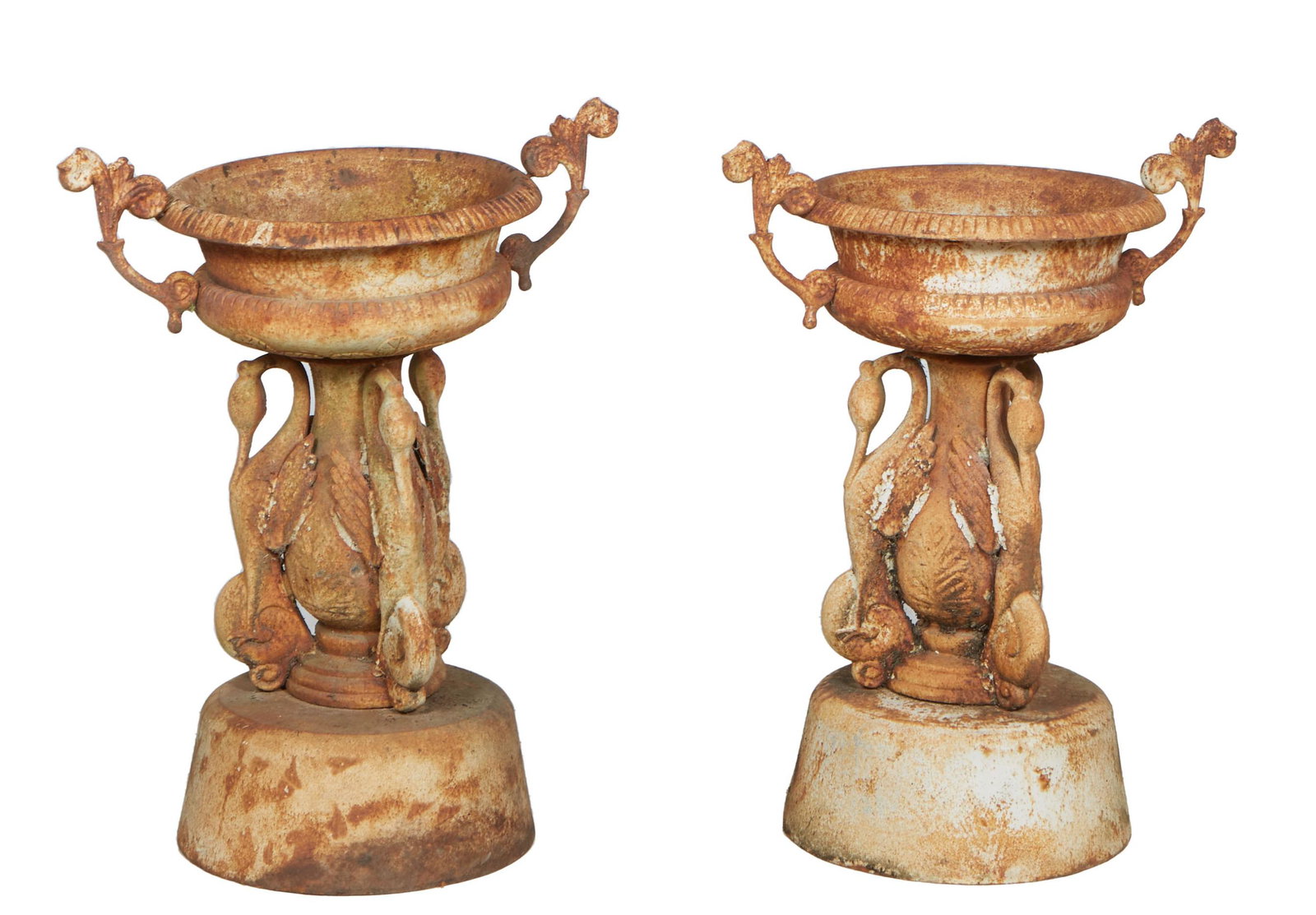 Pair of Cast Iron Jardinieres, 20th c., of campana form with scrolled leaf handles, on a swan: Pair of Cast Iron Jardinieres, 20th c., of campana form with scrolled leaf handles, on a swan mounted support, on an integral large circular base, H.- 34 in., Dia.- 28 in.