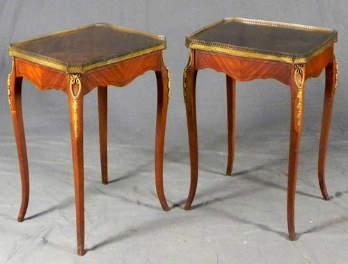 Pair of Louis XV Style Carved Mahogany Ormolu Mount: Pair of Louis XV Style Carved Mahogany Ormolu Mounted Lamp Tables, early 20th c., the shaped octagonal tops with pierced brass galleries, on tapered ormolu mounted cabriole legs, with glass tops, H.- 