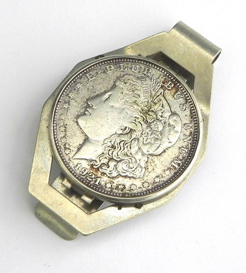 Two Silver Dollar Items consisting of a money clip: Two Silver Dollar Items consisting of a money clip with a 1921 Morgan dollar and a Swank watch, made from an 1879 Morgan dollar. (2 Pcs.)