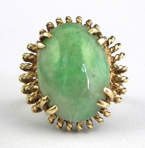 14K Yellow Gold Lady's Dinner Ring, with an oval c: 14K Yellow Gold Lady's Dinner Ring, with an oval cabochon jade stone, the stone presented to the owner's father, who was fire chief in Yokohama, Japan, under Douglas McArthur after the war, by the cit