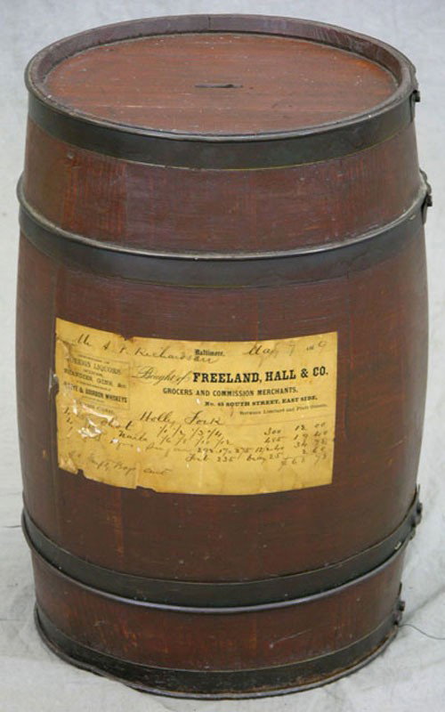 Antique Wooden Nail Keg, 19th c., the exterior wit: Antique Wooden Nail Keg, 19th c., the exterior with a grocer's bill for kegs of nails, dated May 7, 1869, now with a slot for use as a bank, H.- 17 1/4 in., Dia.- 12 in.