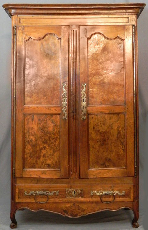French Provincial Louis XV Style Carved Burled Elm: French Provincial Louis XV Style Carved Burled Elm Armoire, c. 1820, with an ogee crown over two double paneled doors with long steel fiche hinges and escutcheons, over a lower drawer with steel handl