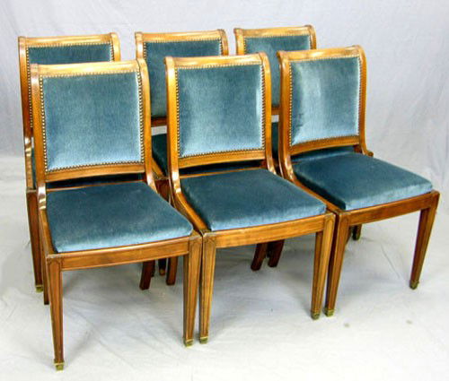 Set of Six Louis Philippe Style Carved Walnut Dini: Set of Six Louis Philippe Style Carved Walnut Dining Chairs, early 20th c., with concave upholstered backs to slip seats, on line decorated square tapered legs to bronze sabots, upholstered in blue ve