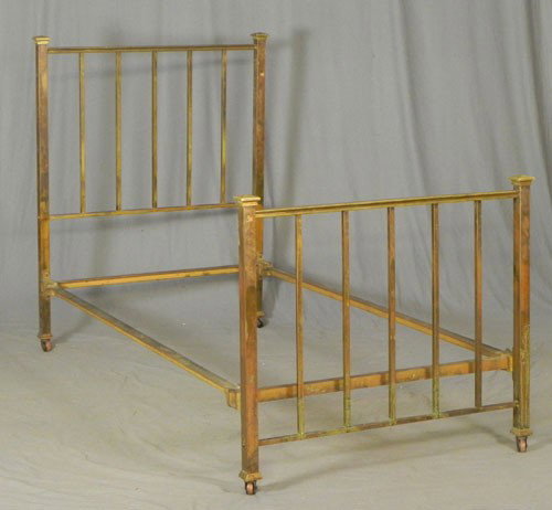 Brass Single Bed, c. 1910, with square spindles a: Brass Single Bed, c. 1910, with square spindles and square posts, with peaked square caps, H.- 50 1/2 in., Int. W.- 39 1/2 in., Int. D.- 74 1/2 in.