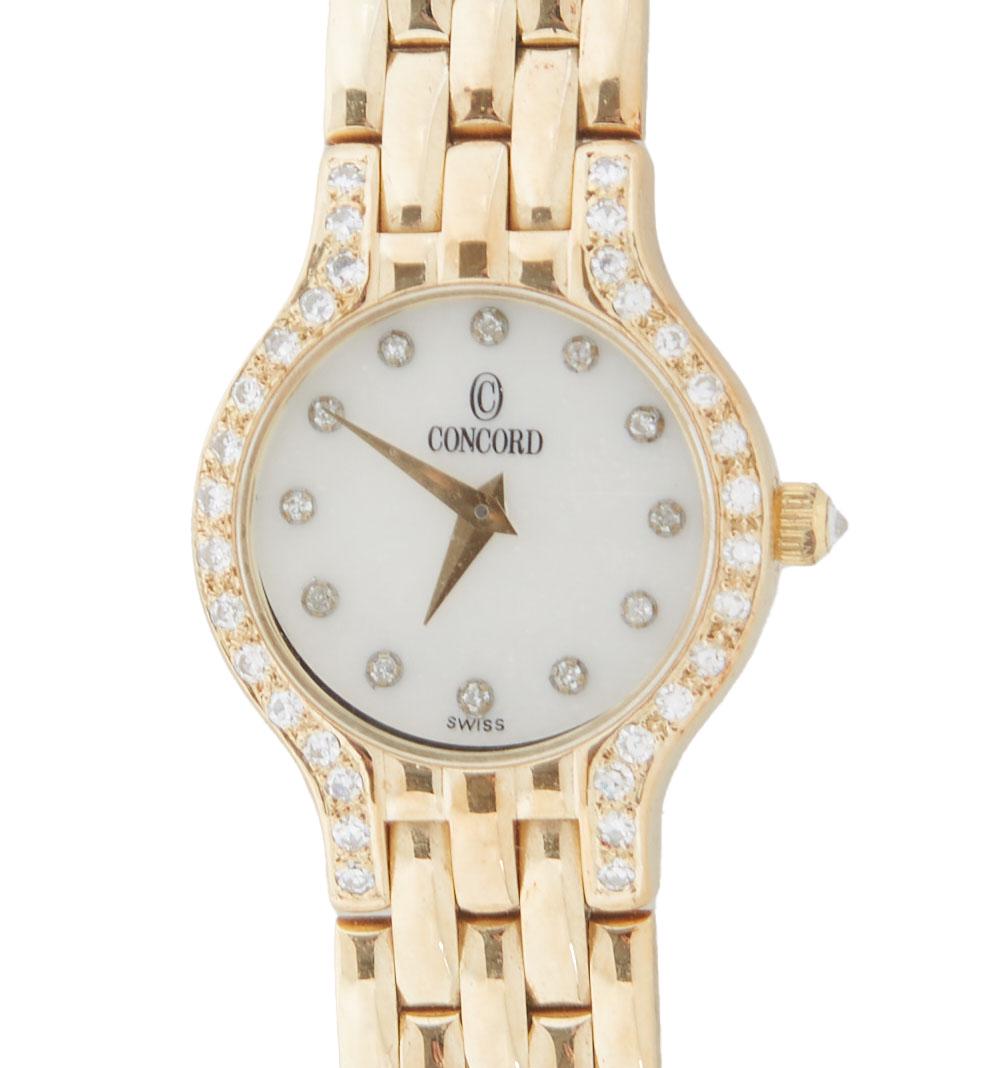 Lady's 14K Yellow Gold Concord Quartz Wristwatch, Ser. #501215, c. 2002, with a mother-of-pearl face (1 of 3)