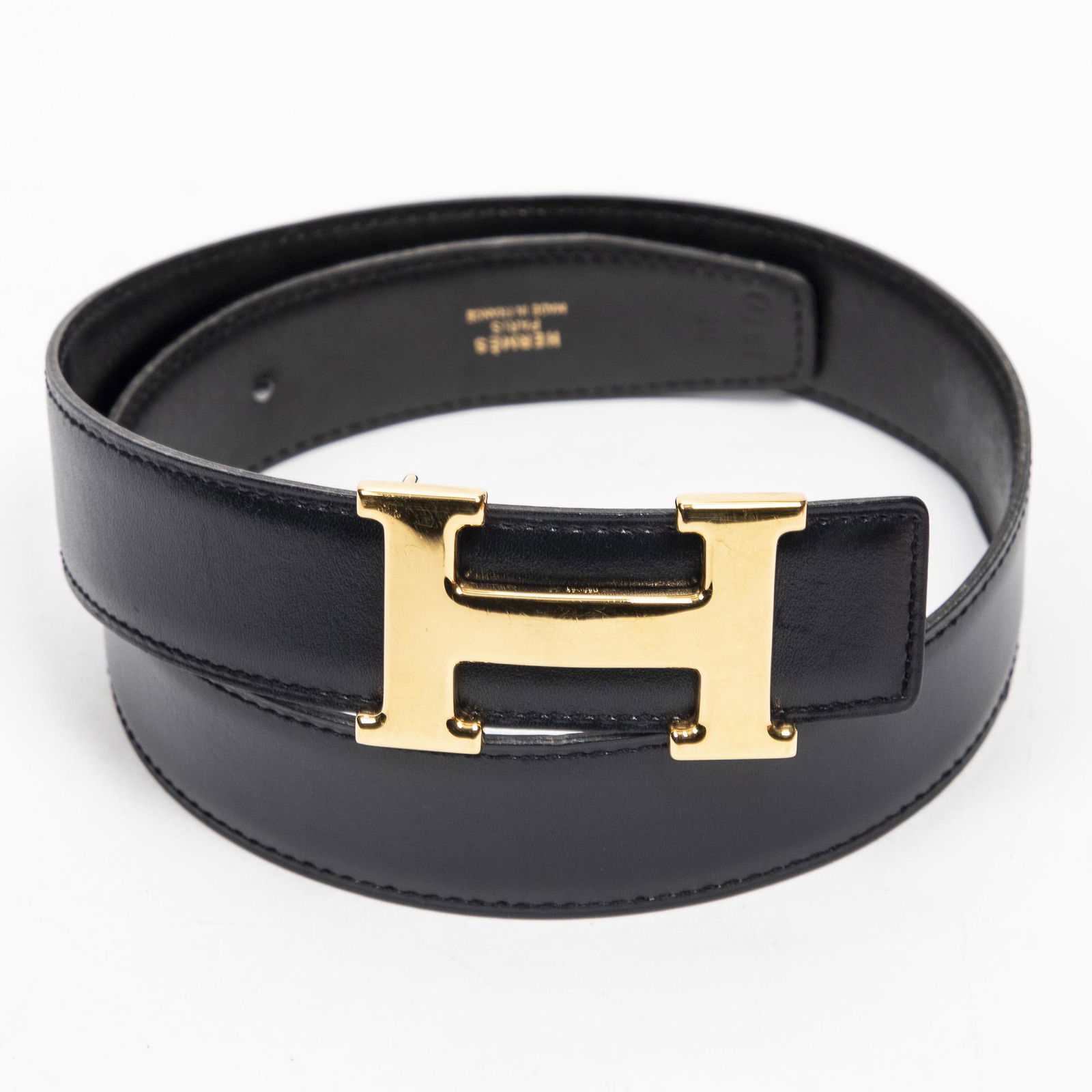Hermes Constance Belt, in black leather with a gold plated H palladium buckle, accompanied with a (1 of 3)